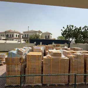 International movers preparing an export shipment in the UAE